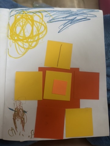 Square house made of orange and yellow squares with a person, sun, and sky